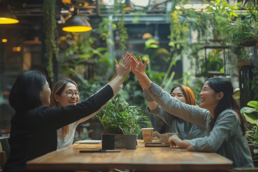 group professional business people to win of celebrating project success.Creative business happy and enjoy gesture hand high five good teamwork together at green plant terrace, Generative AI