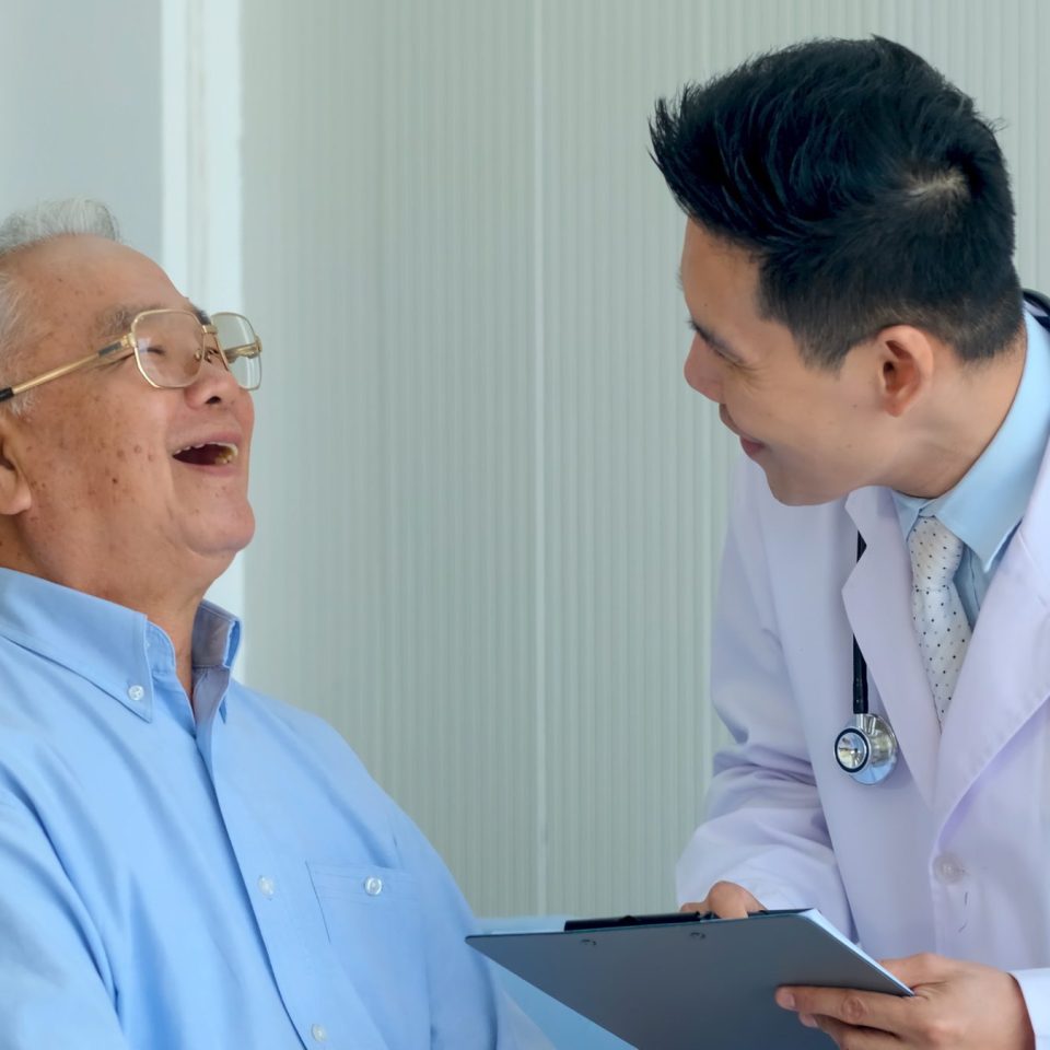 Happy,Asian,Elderly,Man,Patient,Have,Fun,Talking,With,Professional