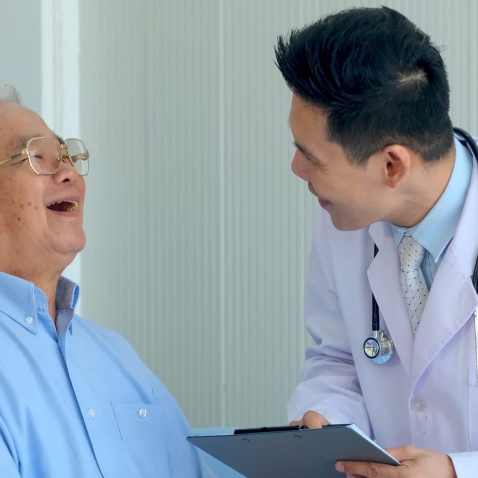 Happy,Asian,Elderly,Man,Patient,Have,Fun,Talking,With,Professional