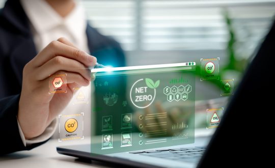 Businessperson,Analyzing,Net,Zero,Carbon,Dashboard,Hologram,,Showing,Co2,Emission